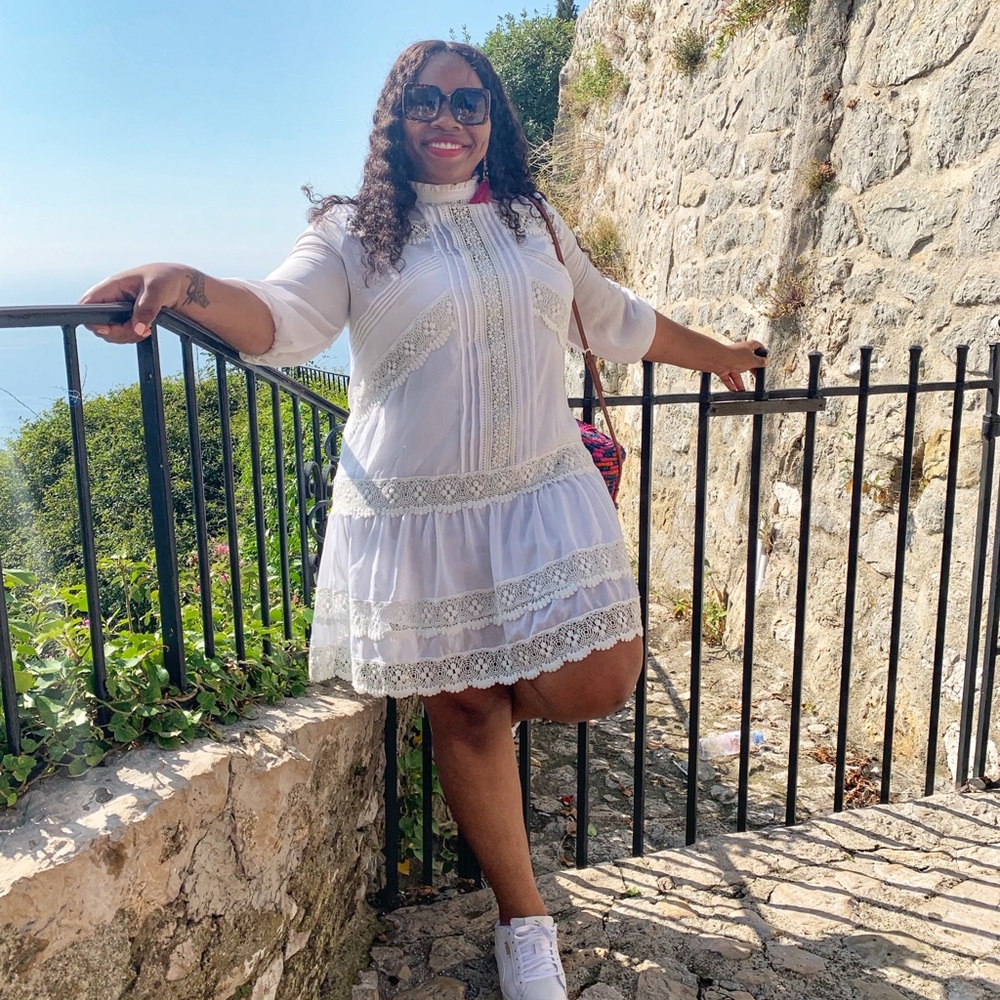 White knee length dress